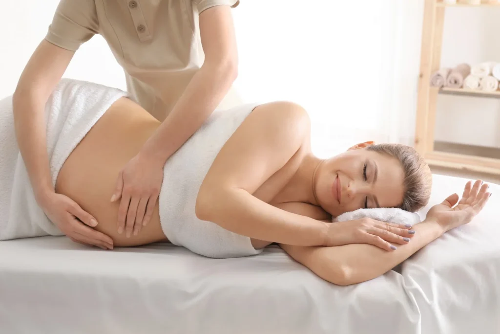 A pregnant woman enjoying her massage
