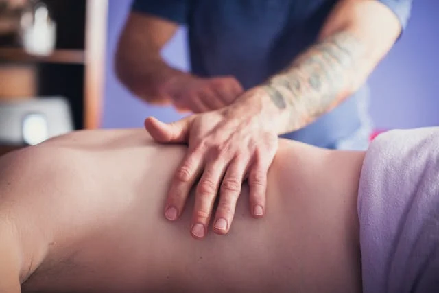 A person getting a back massage